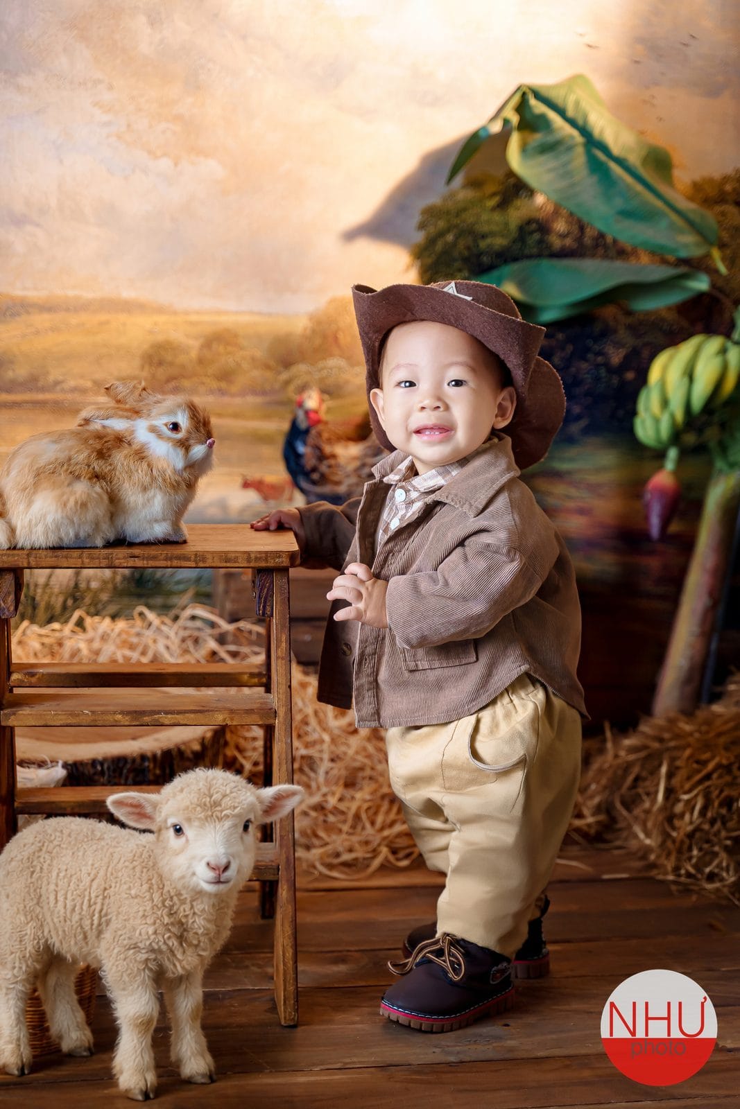 chụp ảnh bé cùng thú cưng tại studio